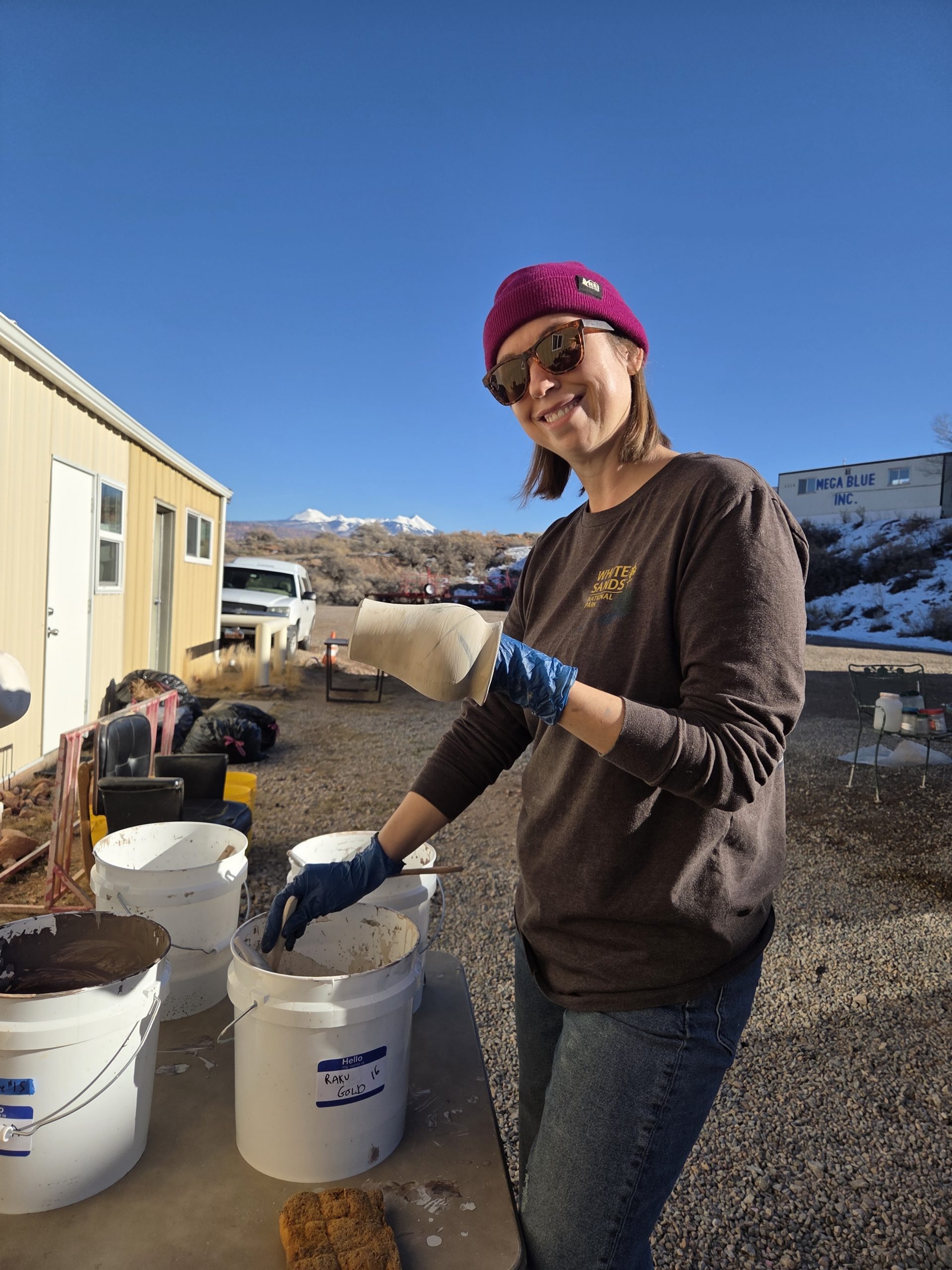 Stephanie Hillman glazing pottery - Hillman Design Studio